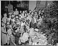 Image of Children looking at Christmas tree at Seattle Children's Home, December 1942