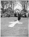 Image of Pastor McKinney breaking ground for church addition, Seattle, April 28, 1962