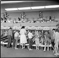 Image of People playing carnival game at Fun Forest, Seattle Center, June 1963