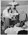 Image of Tip Toppers club members examining sale items, Seattle, August 1958