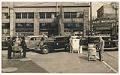 Image of Salesmen with appliances outside Ben Franklin Electric Company, Seattle, circa 1935