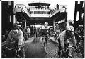 Image of Chilly Hilly bicyclists disembarking ferry, Bainbridge Island, March 1, 1982