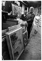 Image of Kenneth Callahan and his wife Beth with paintings, Seattle, March 19, 1973