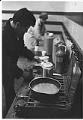 Image of Isidoro Gonzales working in kitchen during occupation of Beacon Hill School, October 18, 1972