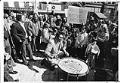 Image of Bernie Whitebear drumming at Wounded Knee support rally, Seattle, March 24, 1973