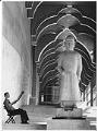 Image of Security guard near Chinese figure at Seattle Art Museum, October 1, 1991