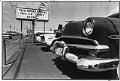 Image of L. Hoyt Motors car lot on Aurora Avenue North, August 1983