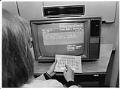 Image of Woman using Peoples Bank home banking program, September 20, 1984