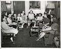 Image of Do Good Club members discussing event, Seattle, February 11, 1948