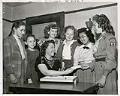 Image of Do Good Club members receiving tickets, Seattle, March 18, 1948