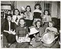 Image of Do Good Club members with donated items, Seattle, November 29, 1948