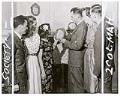 Image of Members and guests examining busts at Monks Club, Seattle, April 27, 1946