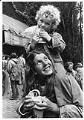 Image of Child and mother eating pretzels at Folklife Festival, Seattle Center, May 27, 1978