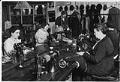 Image of Seamstresses mending garments at Goodwill, Seattle, November 21, 1934