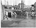 Image of Chinese girls drill team honoring war casualties at memorial ceremony, Seattle, May 30, 1961