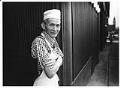 Image of Chinatown - International District restaurant worker taking a break, Seattle, July 8, 1988