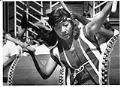 Image of Woman drumming at Chinatown - International District's Summer Festival, Seattle, July 15, 1990