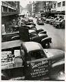 Image of Food merchants receiving goods, Seattle, July 28, 1950