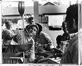 Image of Joe Torlai selling produce at Inner City Market, Seattle, August 2, 1975