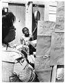 Image of Ray Daniels selling produce at Inner City Market, Seattle, July 31, 1976