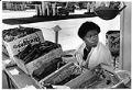 Image of Tina Head staffing stall at Mount Baker farmers market, Seattle, August 3, 1980
