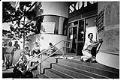 Image of Teacher and class on steps of closed SOIC building, August 1986