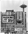 Image of Reduced parking fees after World's Fair, Seattle, December 28, 1962