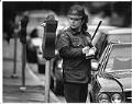 Image of Mariana Matthews writing a parking ticket, Seattle, May 7, 1991