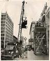 Image of Typesetting machine hanging from crane, Seattle, December 5, 1948