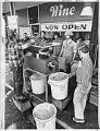 Image of Wine makers crushing grapes, Bellevue, October 4, 1975