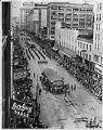Image of Balloon floats parading south on Third Avenue, Seattle, November 20, 1954
