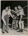 Image of Boxers Harry Matthews and Don Cockell in ring after fight, Seattle, July 30, 1954