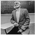 Image of Hans Dehmelt sitting in UW classroom, Seattle, October 12, 1989