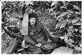 Image of Man sitting in temporary shelter, Seattle, April 16, 1987