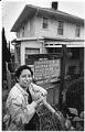 Image of Beatrice LaFramboise outside Providence Regina House food bank, Seattle, November 4, 1986