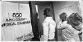 Image of Family seeking information on victims of Wah Mee Club massacre, Seattle, February 20, 1983