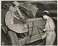 Image of Transportation Corps WACs fixing an Army Jeep, Seattle, July 1944