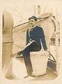 Image of Frank James sitting on ship deck, circa 1895