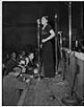 Image of Woman singing with Count Basie orchestra, November 27, 1947