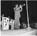 Image of Louis Armstrong playing the trumpet with his band, Seattle, July 17, 1944