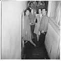 Image of People in a hallway, circa 1947