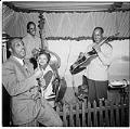 Image of Jazz trio with vocalist on stage at the Basin Street club, Seattle, March 24, 1945