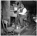 Image of Piano player singing on stage at the Black and Tan club, Seattle, November 11, 1944