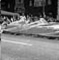 Image of Philippine Republic representatives riding in July 4th parade, Seattle, circa 1953