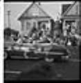 Image of Festival queen riding in parade, Seattle, circa 1953