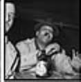 Image of Two men sitting at a bar, Seattle, circa 1953