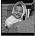 Image of Carol Peoples looking over her father's shoulder, Seattle, circa 1953
