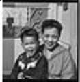 Image of Millie and Kaylon Mar sitting on doorstep, Seattle, circa 1953