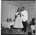 Image of Sonny and Gertrude Peoples posing in formal attire, Seattle, circa 1953