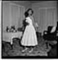 Image of Delbert Moore posing in semi-formal attire, Seattle, circa 1953